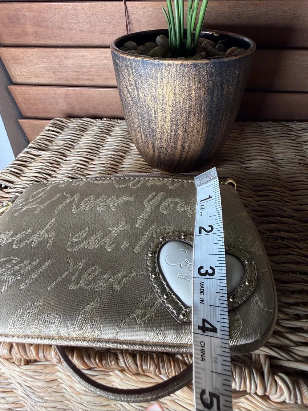 Coach Beige Script Wristlet with Heart Patch